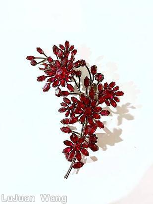 Schreiner extra long stem 3 trembler pin 3 branch of 9 navette oval center ruby jewelry