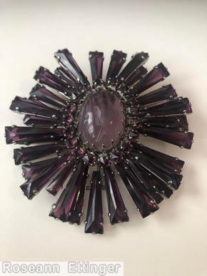 Schreiner giant ruffle keystone large oval center plum keystone marbled oval cab center 1 round small surrounding plum inverted stone jewelry