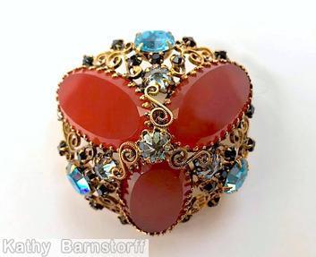 Schreiner high domed radial 3 large oval cab pin scrollwork 3 large chaton 21 small chaton carnelian oval flat top stone ice blue inverted goldtone jewelry