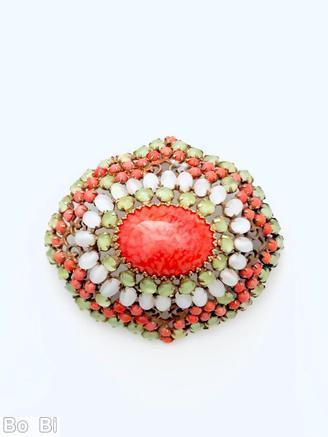 Schreiner high domed radial diamond shaped pin large oval cab center filigree 5 rounds scrollwork apple green moonglow small chaton coral small chaton white moonglow oval stone marbled coral large oval cab center goldtone jewelry