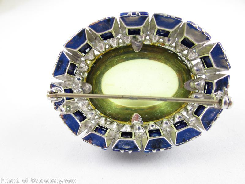 Schreiner large highly domed oval shaped jelly belly pin large half egg shaped jelly belly center 15 small square stone at side ice peridot lapis blue ice blue silvertone jewelry