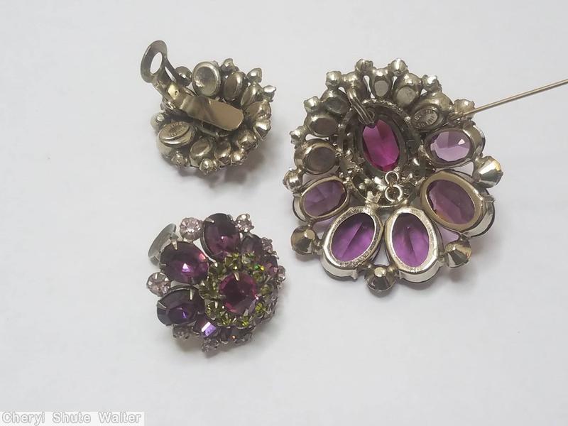 Schreiner large oval center teardrop shaped pin varied size oval cab inverted stone 2 rounds around center purple peridot fuchsia navy ice pink jewelry