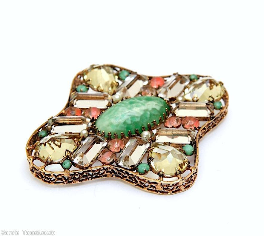 Schreiner maltese radial shadow box pin large oval cab center 8 rectangle 4 sided stone 4 large teardrop large marbled jade oval cab center peach venetian small chaton large faceted clear champagne teardrop jade small chaton crystal emerald cut goldtone jewelry