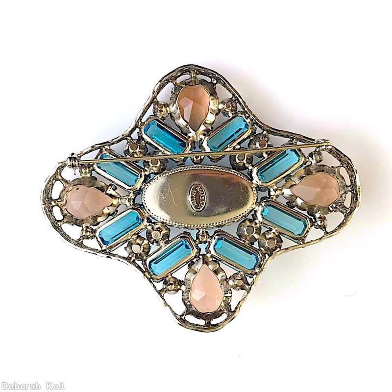 Schreiner maltese radial shadow box pin large oval cab center 8 rectangle 4 sided stone 4 large teardrop marbled coral large oval cab clear aqua 4 sided stone pale topaz large teardrop pale aqua venetian chaton carnelian jewelry