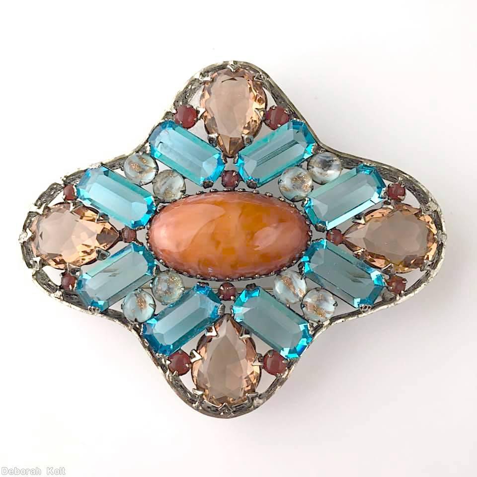 Schreiner maltese radial shadow box pin large oval cab center 8 rectangle 4 sided stone 4 large teardrop marbled coral large oval cab clear aqua 4 sided stone pale topaz large teardrop pale aqua venetian chaton carnelian jewelry