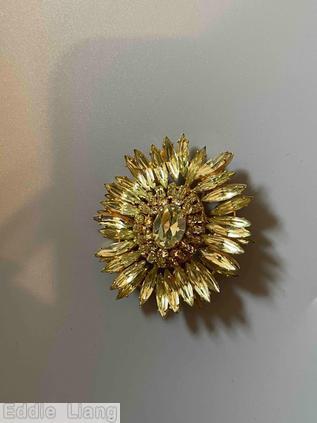 Schreiner navette ruffle pin hook eye domed oval center 2 rounds surrounding stone clear champgne goldtone jewelry