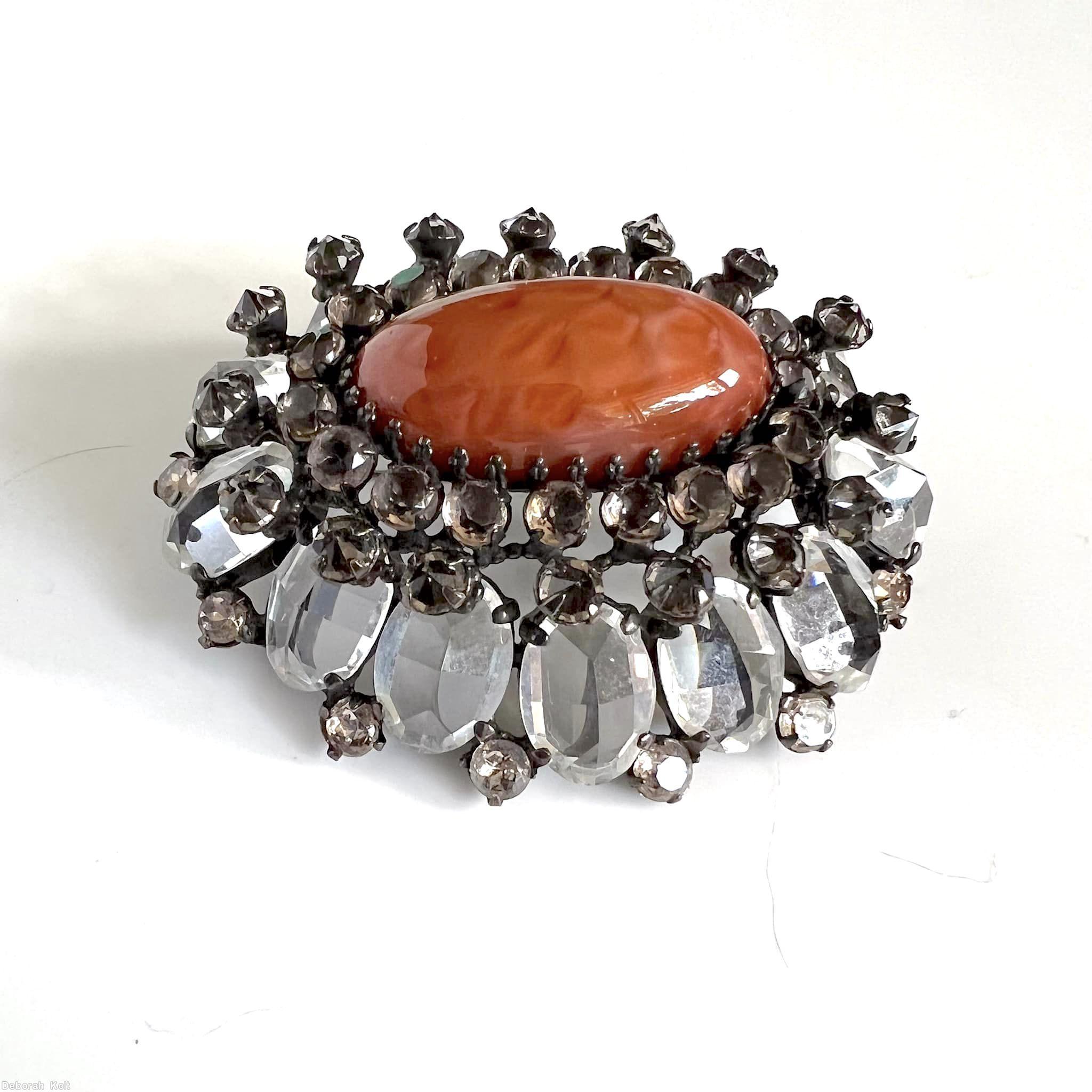 Schreiner oval domed 13 side oval stone pin large oval center 20 surrounding small stone 16 pearls large faceted oval crystal carnelian large oval cab center smoky small chaton silvertone jewelry