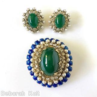 Schreiner oval domed radial pin large oval center 23 surrounding small chaton 3 rounds filigree lapis small oval cab faux pearl crystal small chaton goldtone jewelry