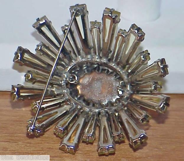 Schreiner oval high domed keystone ruffle pin large oval center varied length keystone clear champagne keystone 1 round small square stone marbled amber large oval cab jewelry