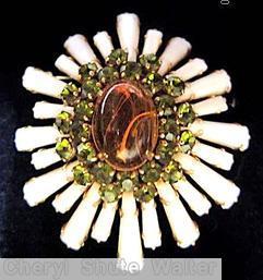 Schreiner oval high domed keystone ruffle pin large oval center varied length keystone white keystone marbled amber large oval cab center peridot 2 round surrounding chaton goldtone jewelry