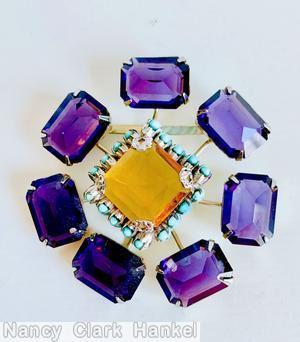 Schreiner radial 7 stem large emerald cut 1 large square faceted crystal highly domed center 18 surrounding small oval stone purple large emerald cut topaz large square faceted center turquoise small oval stone silvertone jewelry