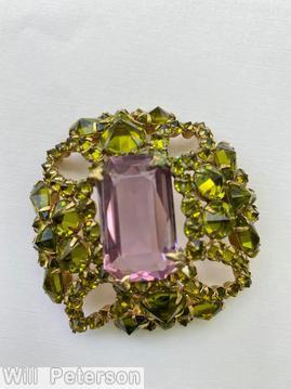 Schreiner rectangle shaped domed radial pin 4 small chaton formed circle at corner 5 large rectangle stone 12 surrounding navette large clear amethyst emerald cut center stone olivine inverted stone goldtone jewelry