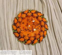 Schreiner round domed moroccan disc center pin 2 rounds chaton 14 surrounding chaton 14 tilted teardrop coral peridot goldtone jewelry