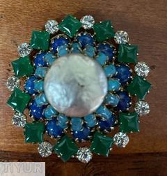 Schreiner round domed radial pin large round cab center 16 surrounding small rectangle stone 11 square stone metalic silver large faux pearl center small rectangle blue turquoise lapis small square emerald crystal chaton silvertone jewelry