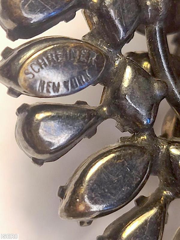 Schreiner round radial center domed pin chaton center 7 surrounding square stone small navette small teardrop crystal gunmetal jewelry