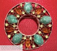 Schreiner round shaped shadow box radial pin ornamental metal frame 5 large oval stone 5 large jelly bean oval green jade nuget amber faceted navette moonglow apple green small chaton jewelry