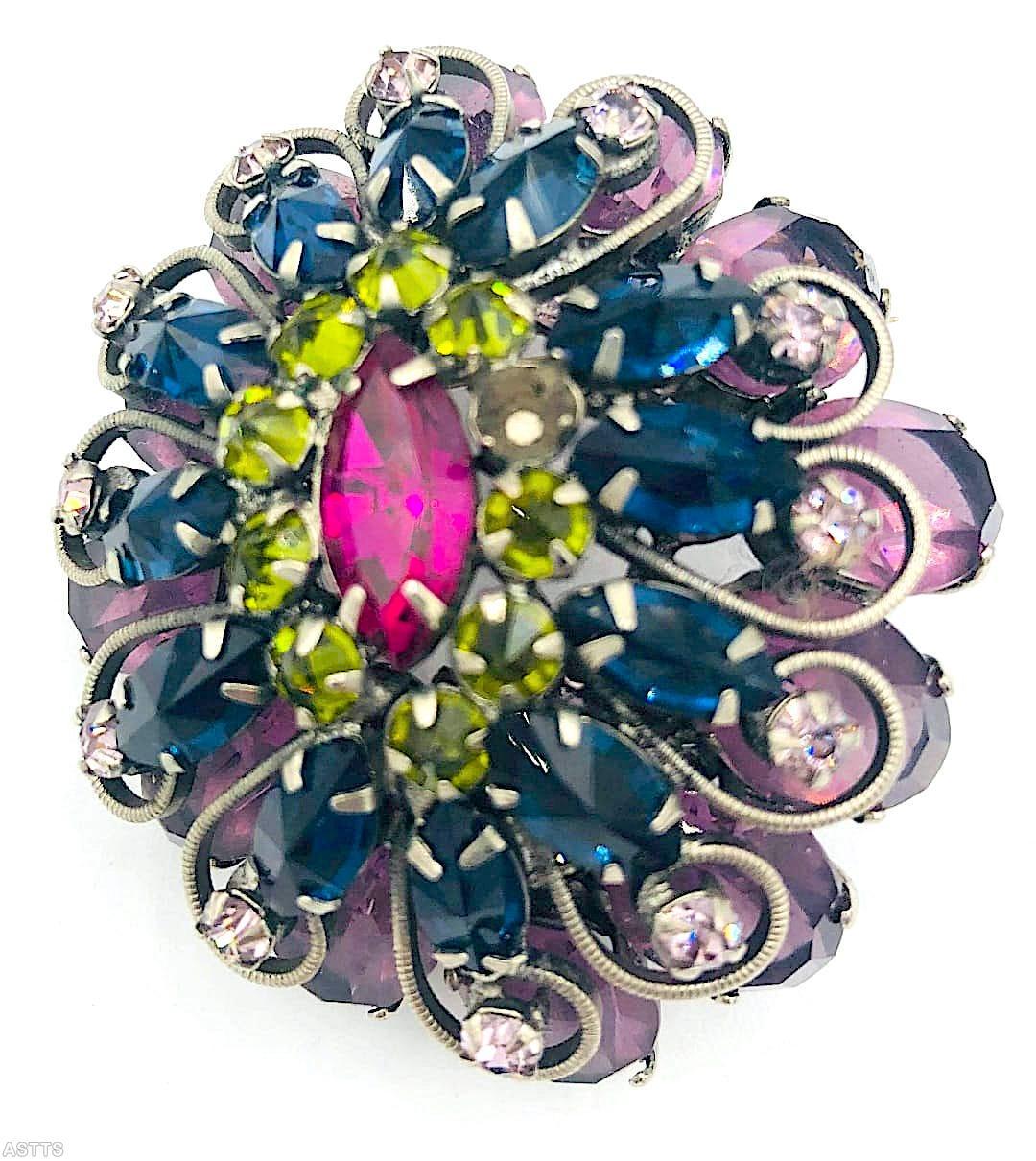 Schreiner scrollwork 2 level domed radial oval pin large navette center 10 surrounding stone lavender faceted large oval stone navy large navette peridot inverted small stone large fuschia navette center silvertone jewelry