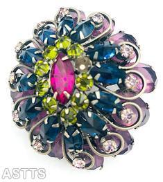 Schreiner scrollwork 2 level domed radial oval pin large navette center 10 surrounding stone lavender faceted large oval stone navy large navette peridot inverted small stone large fuschia navette center silvertone jewelry