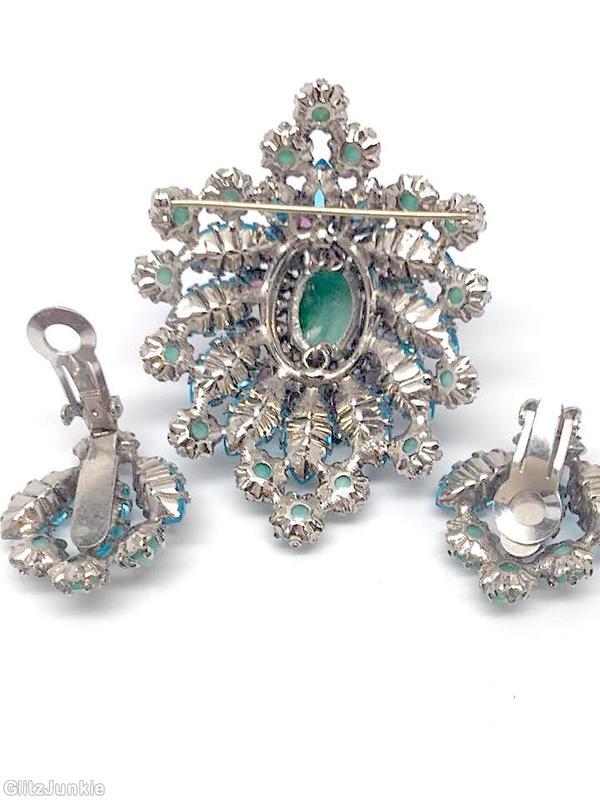 Schreiner shield shaped radial domed pin large oval center hook eye 4 rounds large navette marbled emerald large oval cab center jade stripped aqua navette faux pearl plum navette silvertone jewelry