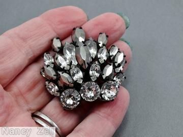 Schreiner side radial 2 level pin 3 chaton varied size navette crystal metalic silver navette jewelry
