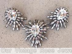 Schreiner small spoke spider radial 2 level pin varied length baguette branch large teardrop center crystal japanned jewelry