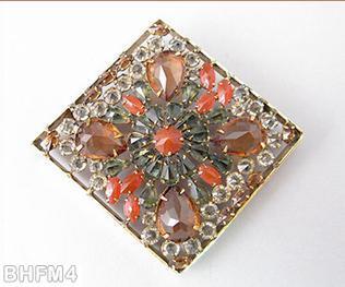 Schreiner square shadow box radial pin 4 large teardrop 1 small chaton center 11 small teardrop surrounding peach large faceted teardrop coral small faceted center chaton smoky small teardrop crystal small inverted coral small navette goldtone jewelry