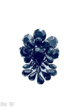 Schreiner top down 5 teardrop down pin large teardrop center 5 large faceted round stone 5 surrounding oval cab navette jet jewelry