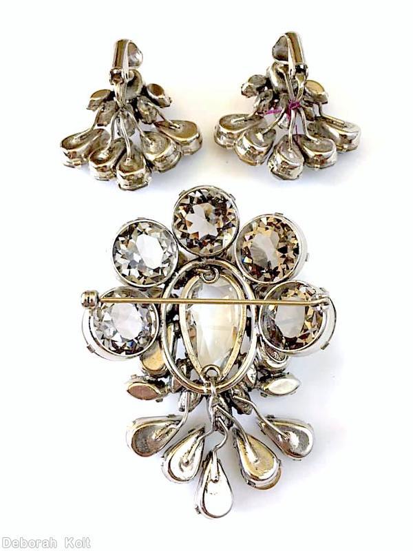 Schreiner top down 5 teardrop down pin large teardrop center 5 large faceted round stone 5 surrounding oval cab navette smoky large round faceted stone brown crystal silvertone jewelry