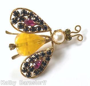 Schreiner trembler bug teardrop body 2 hammered end leg 1 teardrop 12 chaton wired wing chaton head 2 antenna marbled amber teardrop jet chaton purple teardrop faux pearl goldtone jewelry