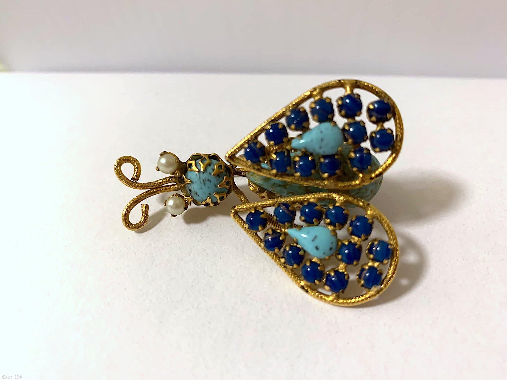 Schreiner trembler bug teardrop body 2 hammered end leg 1 teardrop 12 chaton wired wing chaton head 2 antenna ruby art glass teardrop moonglow pink chaton celery small chaton small teardrop red silvertone jewelry