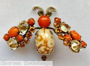 Schreiner trembling wing bug 3 chaton wing oval cab body coral champagne topaz peridot marbled white oval cab body goldtone jewelry