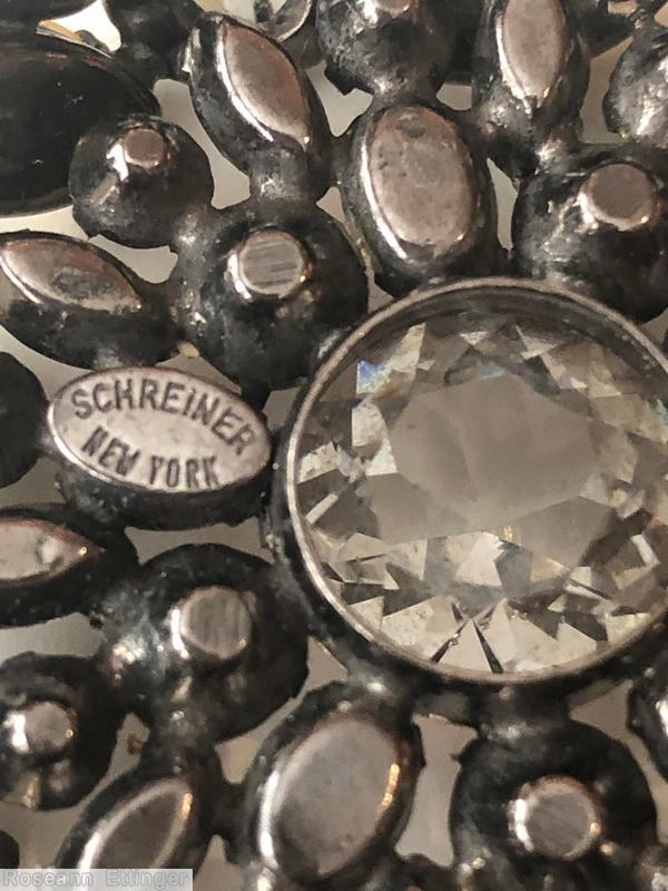 Schreiner triangle concave flat bottom pin large chaton center 10 surrounding stone 3 large oval stone 6 navette smoky large faceted center crysta large inverted stone peach oval stone smoky blue amber jewelry