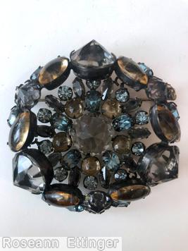 Schreiner triangle concave flat bottom pin large chaton center 10 surrounding stone 3 large oval stone 6 navette smoky large faceted center crysta large inverted stone peach oval stone smoky blue amber jewelry