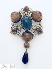 Schreiner triangle top down 1 dangle pin 3 large chaton large oval center filigree malachite round cab navy blue large oval cab center malachite navette ivy moonglow small chaton large navy mottled teardrop goldtone jewelry