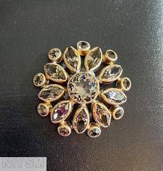 Schreiner radial domed 2 rounds round button large chaton center 9 navette surrounding 9 small chaton crystal goldtone jewelry