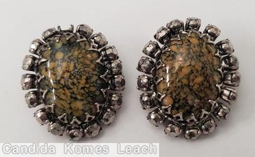 Schreiner 1 large oval cab center 17 surrounding small stone malachite large oval cab metalic silver jewelry
