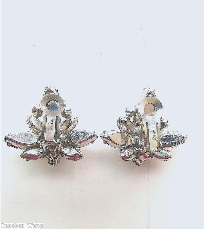 Schreiner 2 level asymmetric radial earring 1 large navette center top 3 navette 2 chaton bottom 3 large navette 3 small navette 2 chaton clear green large faceted navette crystal silvertone jewelry