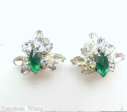 Schreiner 2 level asymmetric radial earring 1 large navette center top 3 navette 2 chaton bottom 3 large navette 3 small navette 2 chaton clear green large faceted navette crystal silvertone jewelry