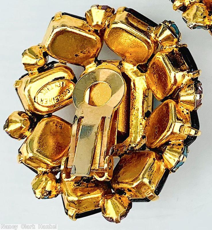 Schreiner 8 rectangle stone surrounding large emerald cut center 8 small chaton pink speckled purple ice blue emerald cut crystal goldtone jewelry