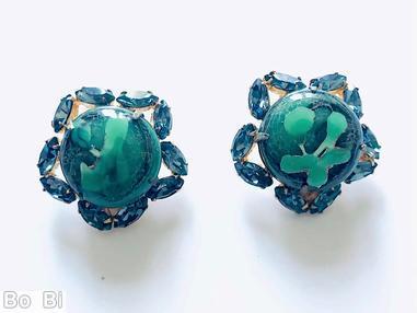 Schreiner large round cab center radial pentagon shaped earring 10 small surrounding navette marbled green large round cab blue small navette goldtone jewelry