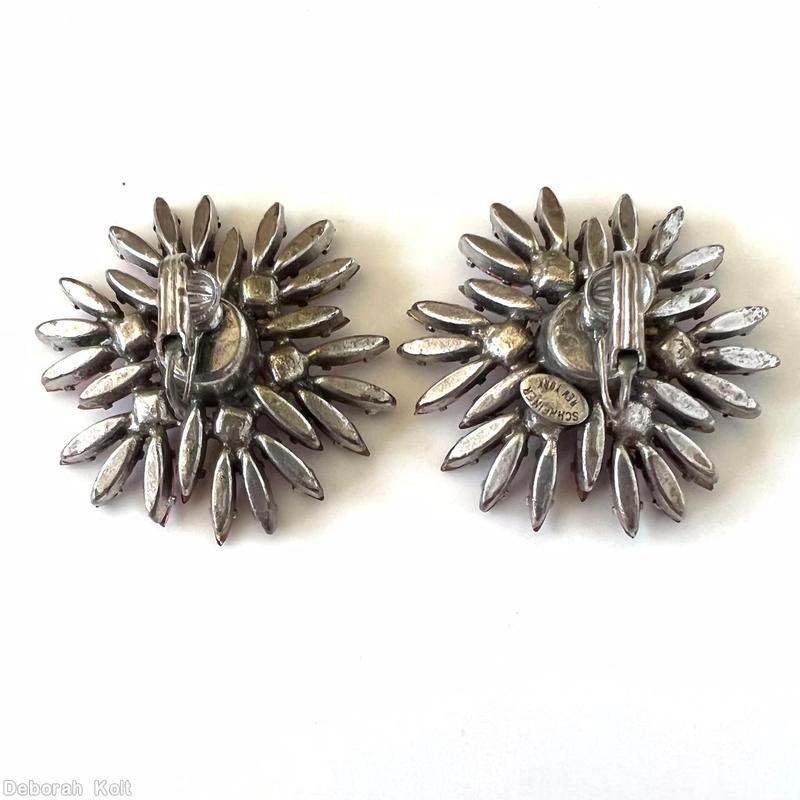 Schreiner many navette radial earring 1 large faceted round stone center 6 small surrounding chaton 24 outside navette purple faceted large round stone center peach small chaton pink navette lavender navette silvertone jewelry