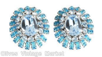 Schreiner oval shaped 2 surrounding level domed earring large oval center 12 small surrounding stone 2nd round small baguette ice blue clear faceted large oval center ice blue small chaton aqua clear small baguette silvertone jewelry