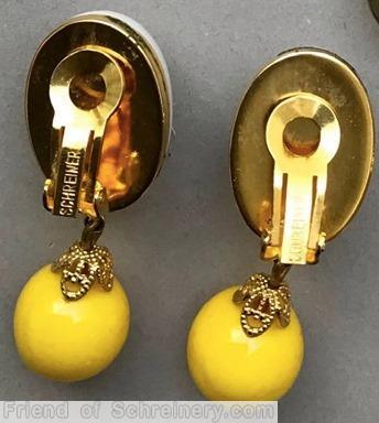 Schreiner top down 2 part dangling earring large oval cab top round globe down milk white large oval cab yellow globe goldtone jewelry