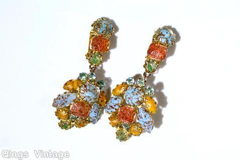 Schreiner top down dangling earring top 3 stone 1 chaton 1 rectangle stone 1 small chaton bottom shield shaped radial domed square stone center 2 large navette 3 chaton 2 small navette 3 small inverted stone all venetian small aqua inverted stone coral blue amber green goldtone jewelry