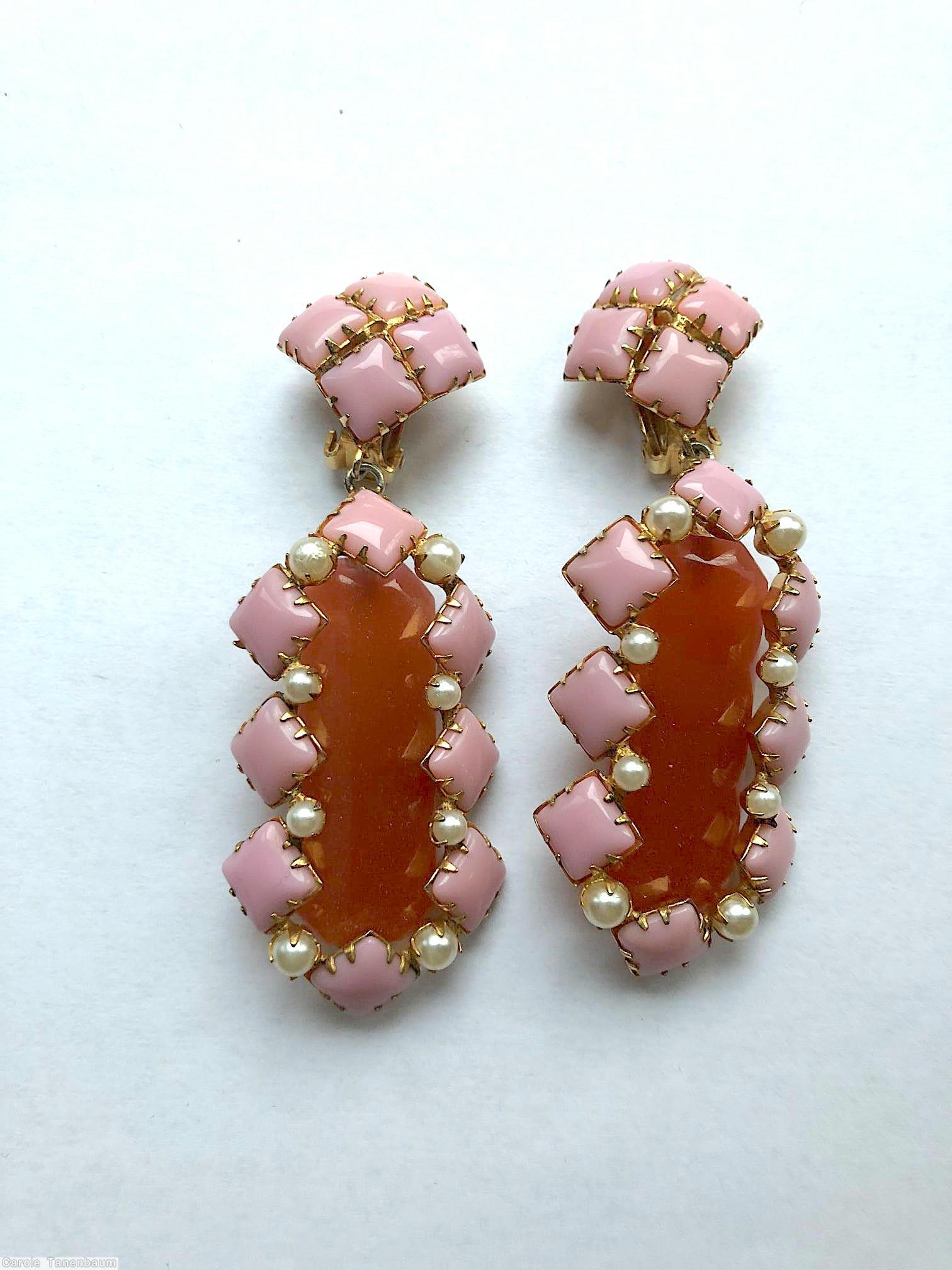 Schreiner top down earring bottom elongated hexagon stone surrounding 8 small square stone 8 faux pearl seeds top 4 small square stone opaque pink small square stone carnelian elongated hexagon goldtone jewelry