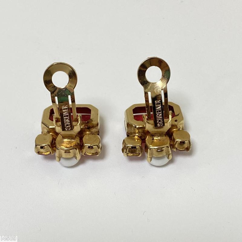 Schreiner top down structure large rectangle emerald cut on top bottom 3 stones 1 faux pearl 2 small chaton ice pink small chaton raspberry large emerald cut goldtone jewelry