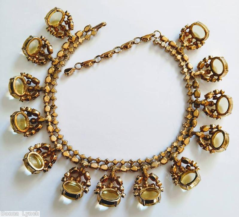 Schreiner 2 strand 13 large sided oval cab end clustered dangling goldtone champgne clear large oval cab inverted stone faux pearl seeds champgne jewelry