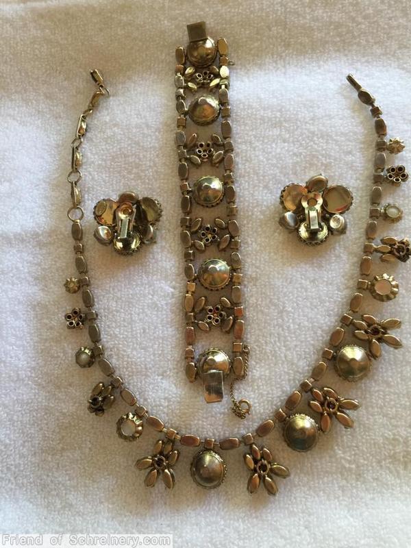 Schreiner single chain of navette and chaton 9 varied size dangling chaton 8 clustered flower moonglow white metalic brown jet goldtone jewelry