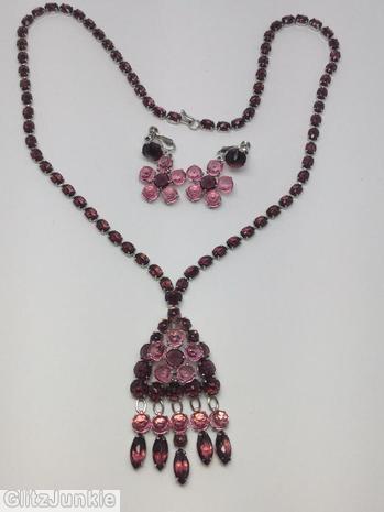 Schreiner single chain of small emerald cut triangle shaped pendant with 5 dangling chaton navette ice pink raspberry silvertone jewelry