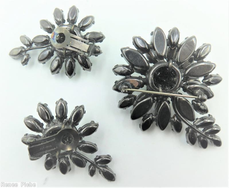 Schreiner 1 flower 1 branch pin large flower 4 rounds small chaton center 6 surrounding small chaton ab smoky jewelry